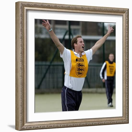 Prince William playing football at the FA Hat-Trick project in Newcastle upon Tyne-null-Framed Photographic Print