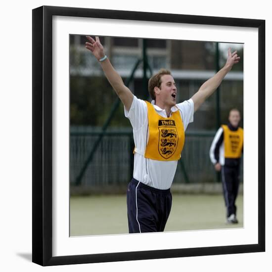 Prince William playing football at the FA Hat-Trick project in Newcastle upon Tyne-null-Framed Photographic Print