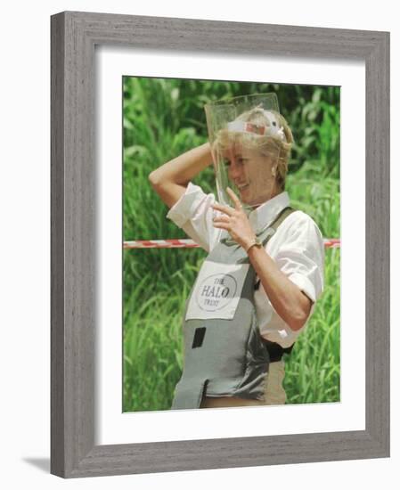 Princess Diana Adjusts Her Face Protector During Her Visit to Mine Fields in Haumbo Angola-null-Framed Photographic Print