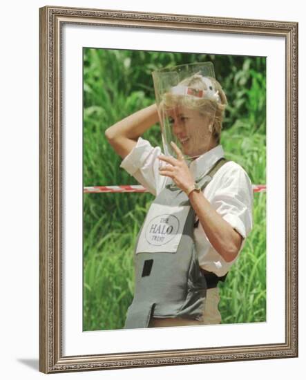 Princess Diana Adjusts Her Face Protector During Her Visit to Mine Fields in Haumbo Angola-null-Framed Photographic Print