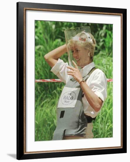 Princess Diana Adjusts Her Face Protector During Her Visit to Mine Fields in Haumbo Angola-null-Framed Photographic Print