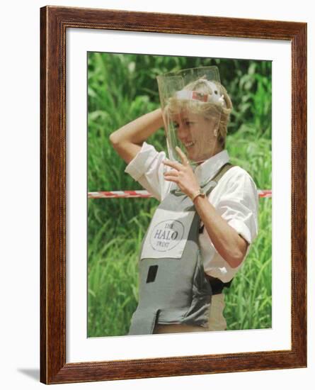 Princess Diana Adjusts Her Face Protector During Her Visit to Mine Fields in Haumbo Angola-null-Framed Photographic Print