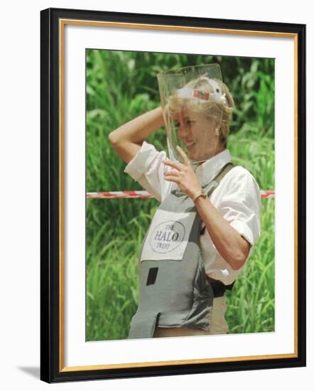 Princess Diana Adjusts Her Face Protector During Her Visit to Mine Fields in Haumbo Angola-null-Framed Photographic Print