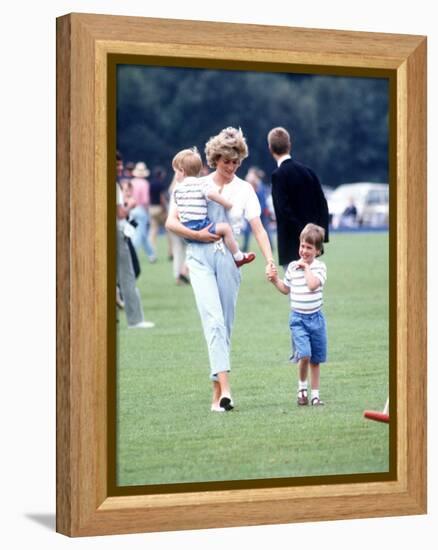 Princess of Wales with Prince Harry and Prince William at a polo match at Windsor-null-Framed Premier Image Canvas