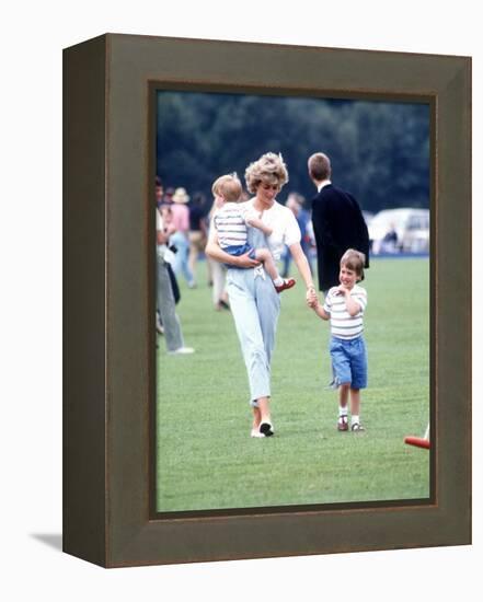 Princess of Wales with Prince Harry and Prince William at a polo match at Windsor-null-Framed Premier Image Canvas