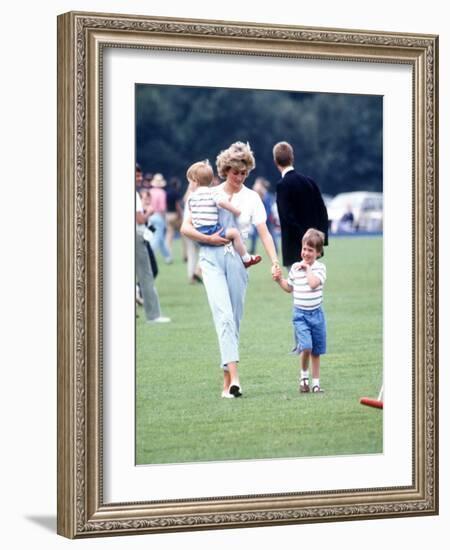 Princess of Wales with Prince Harry and Prince William at a polo match at Windsor-null-Framed Photographic Print