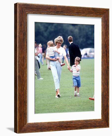 Princess of Wales with Prince Harry and Prince William at a polo match at Windsor-null-Framed Photographic Print