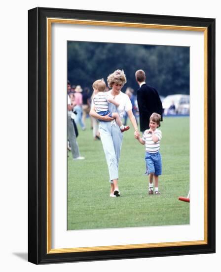 Princess of Wales with Prince Harry and Prince William at a polo match at Windsor-null-Framed Photographic Print