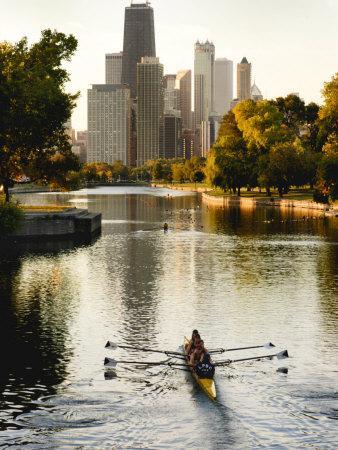 Rowers in Lincoln Park lagoon at dawn, Chicago, Illinois ...