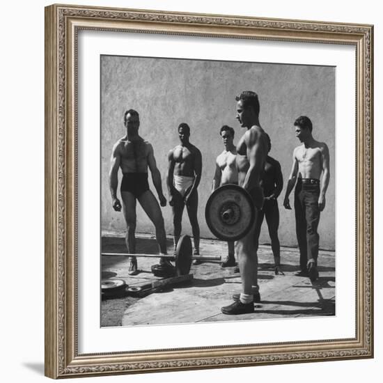 Prisoners at San Quentin Weightlifting in Prison Yard During Recreation Period-Charles E^ Steinheimer-Framed Photographic Print