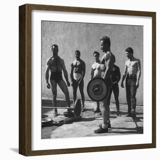 Prisoners at San Quentin Weightlifting in Prison Yard During Recreation Period-Charles E^ Steinheimer-Framed Photographic Print