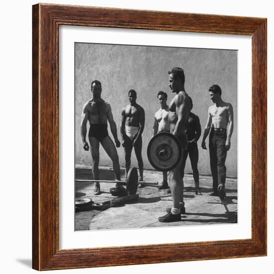 Prisoners at San Quentin Weightlifting in Prison Yard During Recreation Period-Charles E^ Steinheimer-Framed Photographic Print