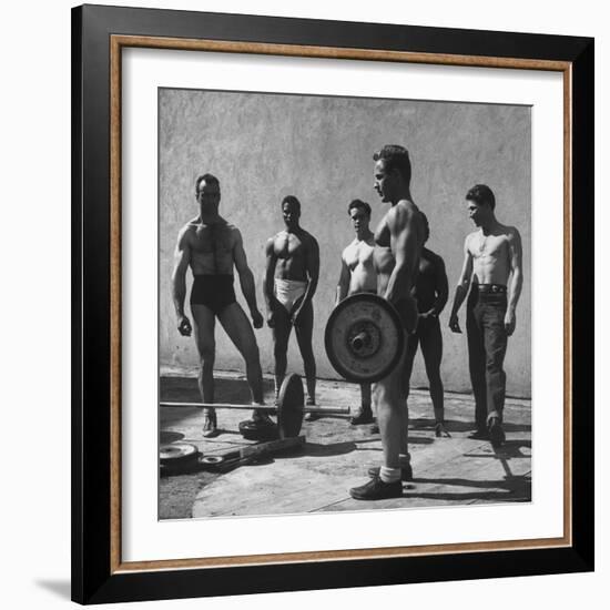 Prisoners at San Quentin Weightlifting in Prison Yard During Recreation Period-Charles E^ Steinheimer-Framed Photographic Print