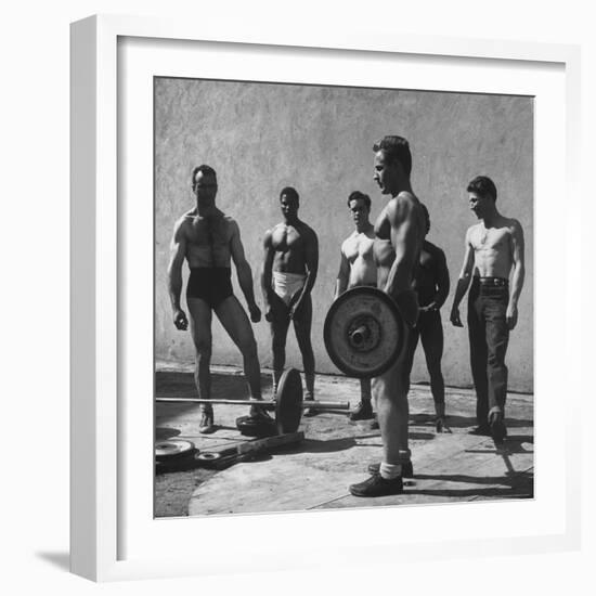 Prisoners at San Quentin Weightlifting in Prison Yard During Recreation Period-Charles E^ Steinheimer-Framed Photographic Print