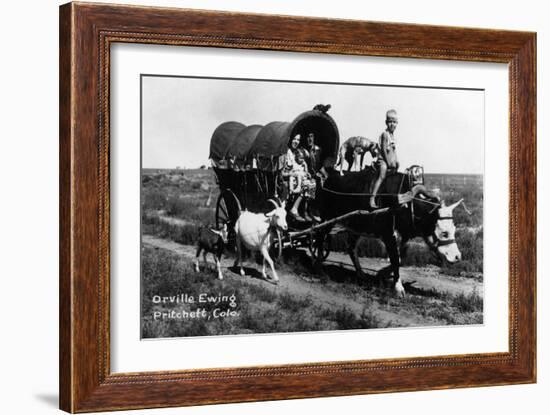 Pritchett, Colorado - Orville Ewing; Covered Wagon Scene-Lantern Press-Framed Art Print