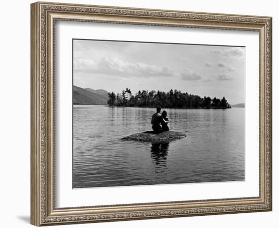 Private Island, Young Couple Embracing on a Small Rock Protruding from the Waters of Lake George-Nina Leen-Framed Photographic Print