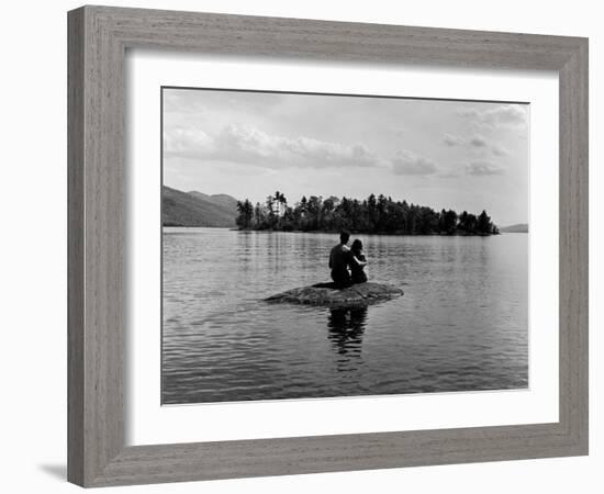 Private Island, Young Couple Embracing on a Small Rock Protruding from the Waters of Lake George-Nina Leen-Framed Photographic Print