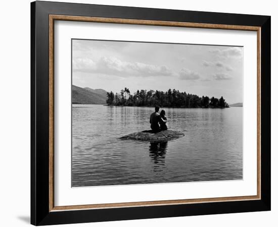 Private Island, Young Couple Embracing on a Small Rock Protruding from the Waters of Lake George-Nina Leen-Framed Photographic Print