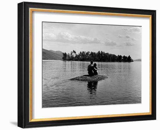 Private Island, Young Couple Embracing on a Small Rock Protruding from the Waters of Lake George-Nina Leen-Framed Photographic Print