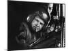 Private Wayne Hoilien, with Cigarette in Mouth, Aboard Yankee Papa 13 as a Gunner-Larry Burrows-Mounted Photographic Print