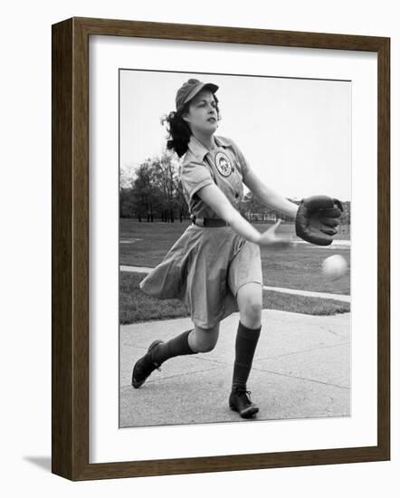 Pro Baseball Pitcher For Rockford Peaches, Caroline Morris, Demonstrating Her Underhanded Delivery-Wallace Kirkland-Framed Photographic Print