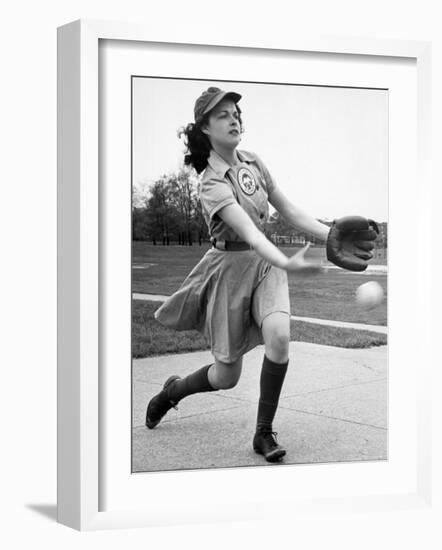 Pro Baseball Pitcher For Rockford Peaches, Caroline Morris, Demonstrating Her Underhanded Delivery-Wallace Kirkland-Framed Photographic Print