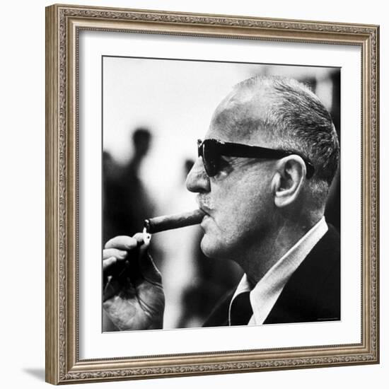 Producer Darryl F. Zanuck Lighting Cigar on the Set of Film "Rapture"-Carlo Bavagnoli-Framed Premium Photographic Print