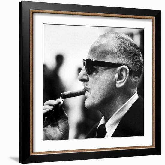 Producer Darryl F. Zanuck Lighting Cigar on the Set of Film "Rapture"-Carlo Bavagnoli-Framed Premium Photographic Print