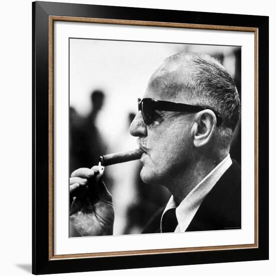 Producer Darryl F. Zanuck Lighting Cigar on the Set of Film "Rapture"-Carlo Bavagnoli-Framed Premium Photographic Print