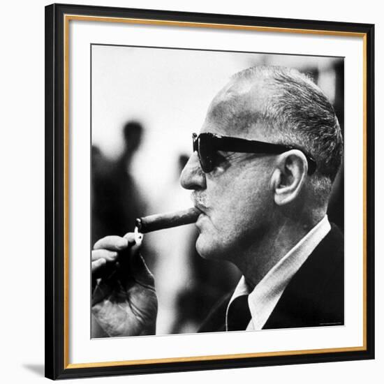 Producer Darryl F. Zanuck Lighting Cigar on the Set of Film "Rapture"-Carlo Bavagnoli-Framed Premium Photographic Print