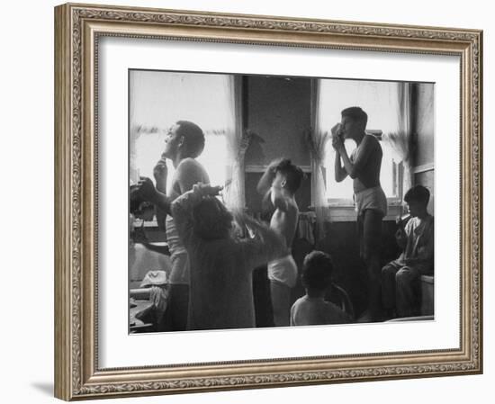 Professional Couple's Big Family, Sharing the Only Bathroom, Early in the Morning-Gordon Parks-Framed Photographic Print