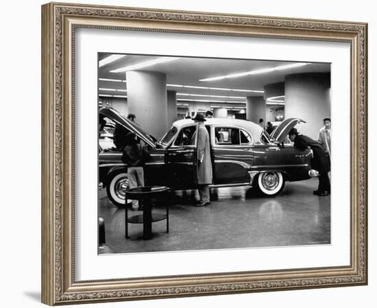 Prospective Buyers Looking over New Dodge Royal at Chrysler Show Room-Ralph Morse-Framed Photographic Print