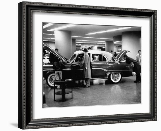 Prospective Buyers Looking over New Dodge Royal at Chrysler Show Room-Ralph Morse-Framed Photographic Print