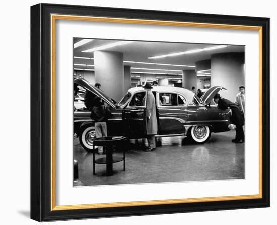 Prospective Buyers Looking over New Dodge Royal at Chrysler Show Room-Ralph Morse-Framed Photographic Print