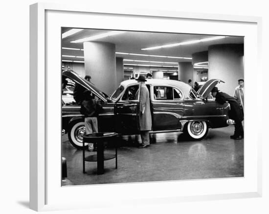 Prospective Buyers Looking over New Dodge Royal at Chrysler Show Room-Ralph Morse-Framed Photographic Print