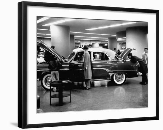 Prospective Buyers Looking over New Dodge Royal at Chrysler Show Room-Ralph Morse-Framed Photographic Print