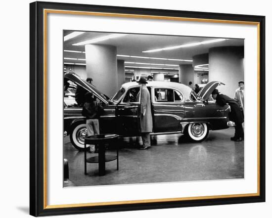 Prospective Buyers Looking over New Dodge Royal at Chrysler Show Room-Ralph Morse-Framed Photographic Print