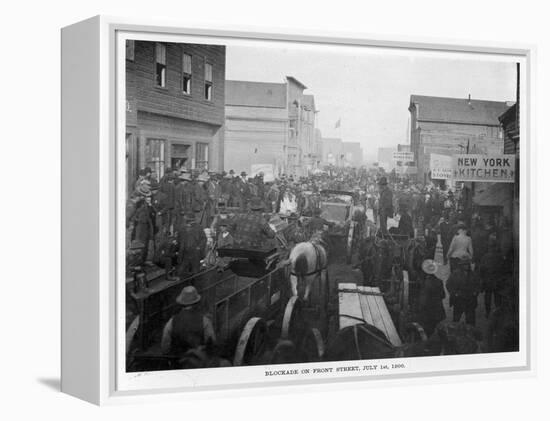 Prospectors Crowd Front Street, Nome, Alaska, at the Height of the Gold Rush-null-Framed Premier Image Canvas