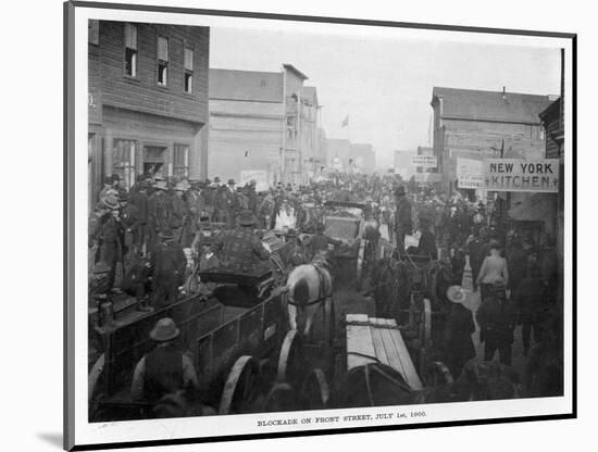 Prospectors Crowd Front Street, Nome, Alaska, at the Height of the Gold Rush-null-Mounted Photographic Print