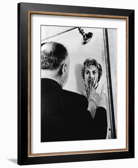 PSYCHO, 1960 directed by ALFRED HITCHCOCK On the set, Alfred Hitchcock directs Janet Leigh (b/w pho-null-Framed Photo