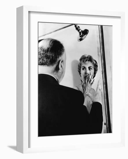PSYCHO, 1960 directed by ALFRED HITCHCOCK On the set, Alfred Hitchcock directs Janet Leigh (b/w pho-null-Framed Photo