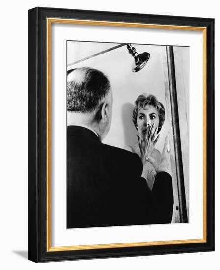 PSYCHO, 1960 directed by ALFRED HITCHCOCK On the set, Alfred Hitchcock directs Janet Leigh (b/w pho-null-Framed Photo