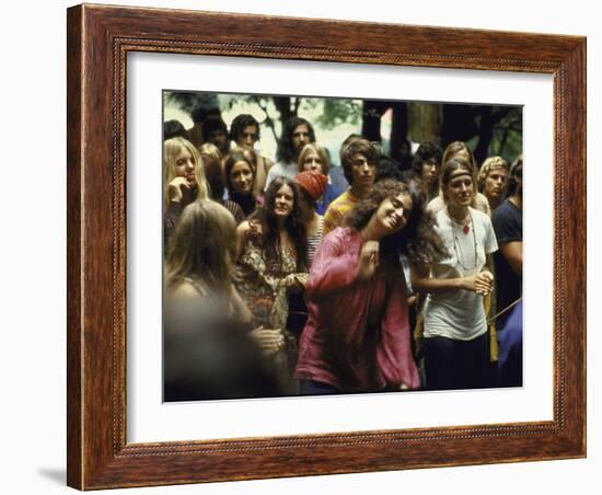 Psylvia, Dressed in Pink Indian Shirt Dancing in Crowd, Woodstock Music and Art Festival-Bill Eppridge-Framed Photographic Print