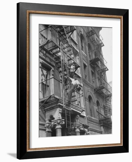 Puerto Rican Boys Climbing on Tenement Fire Escape-Al Fenn-Framed Photographic Print