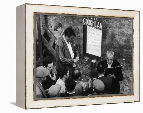 Punters Collect their Winnings from a Bookmaker at Dingle Racecourse, County Kerry, Ireland-Henry Grant-Framed Premier Image Canvas