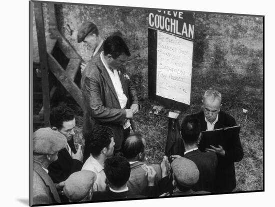 Punters Collect their Winnings from a Bookmaker at Dingle Racecourse, County Kerry, Ireland-Henry Grant-Mounted Photographic Print