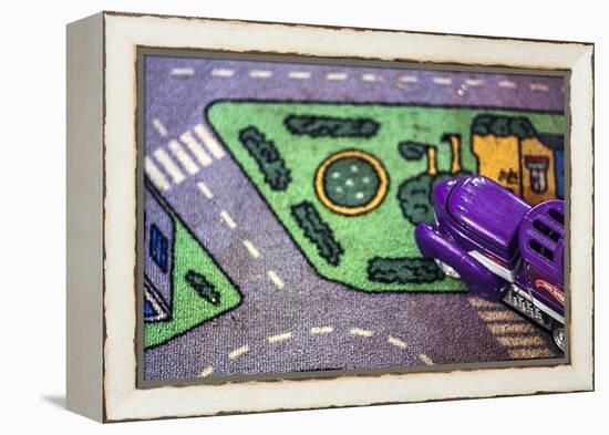 Purple Toy Car on Street Mat-null-Framed Stretched Canvas