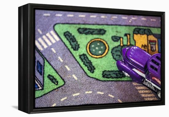 Purple Toy Car on Street Mat-null-Framed Stretched Canvas