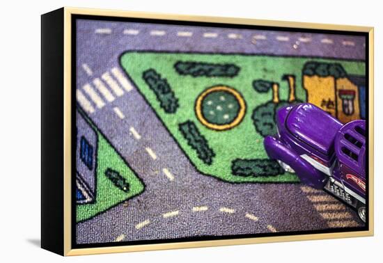 Purple Toy Car on Street Mat-null-Framed Stretched Canvas