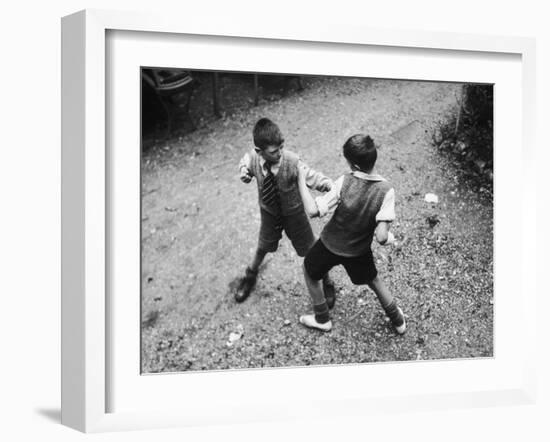 Put 'Em Up!' Two Boys Enjoy a Game of Fisticuffs in a Garden or Playground-null-Framed Photographic Print